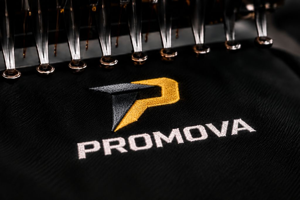 Promovan työvaatteita logopainatuksella